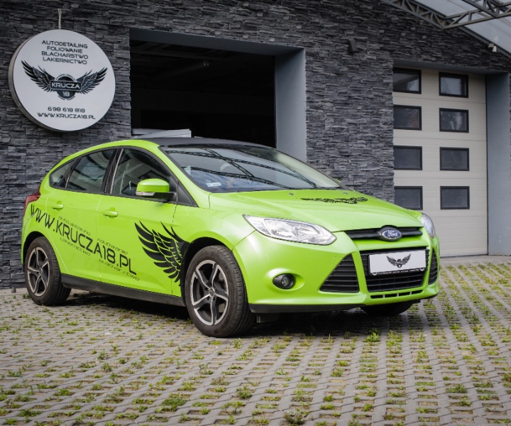 Auta zastępcze - Ford Focus - zielony - ujęcie pasażer